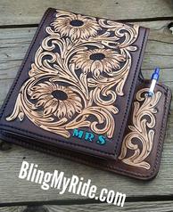 Hand tooled leather reciept book with pen holder.