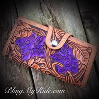 Hand tooled and painted leahter floral womans wallet.