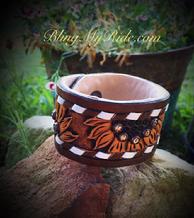 Hand tooled sunflower leather cuff bracelet. Bucksitiched and swarovskis