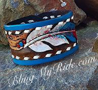 Hand tooled, painted and buck stitched leather cuff bracelet. Feathers and buckstitch