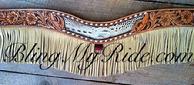 Hand tooled and inlaid tripping collar with buckstitch and fringe!