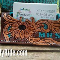 Hand tooled leather business card holder with initials.