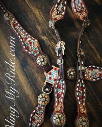 Beautiful bling tack set with Upgraded two-tone hardware.